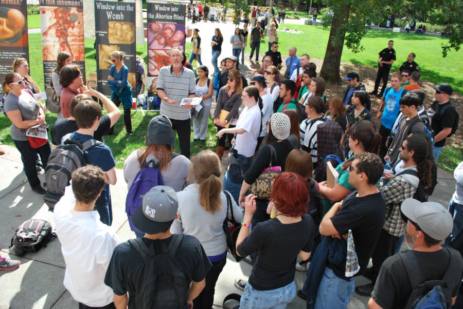 Demonstrators+draw+crowds+at+the+SRJC+campus+with+their+pro-life+rhetoric+and+graphic+images+that+shock+some+students+and+brought+out+emotional+responses+from+others.