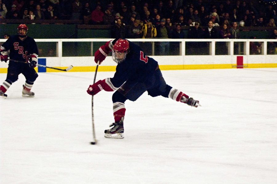 Polar Bear defenseman Bryan Vrba scores a goal against SJSU goalie on Jan. 21. Polar Beara beat the SJSU Spartans, 15-1.