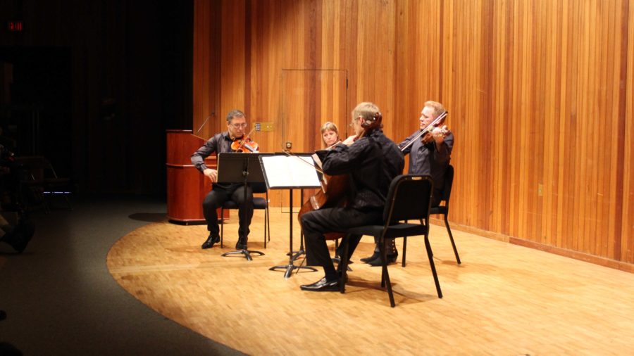 The+Rossetti+String+Quartet+awes+spectators+with+a+grand+performance+reaching+new+heights+of+musical+ability+on+the+stage+at+the+Newman+Auditorium.