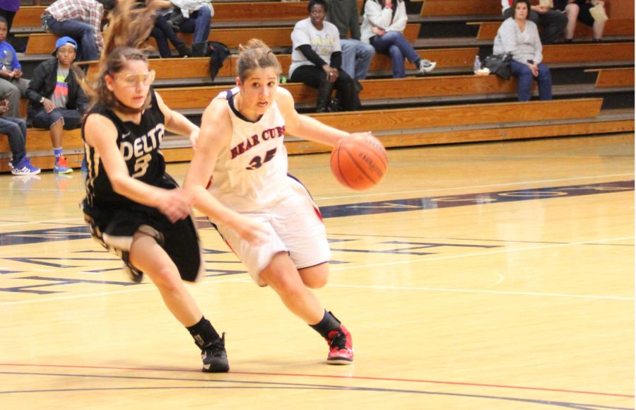 Sophomore guard Whitney Edens drives to the basket against Delta College.