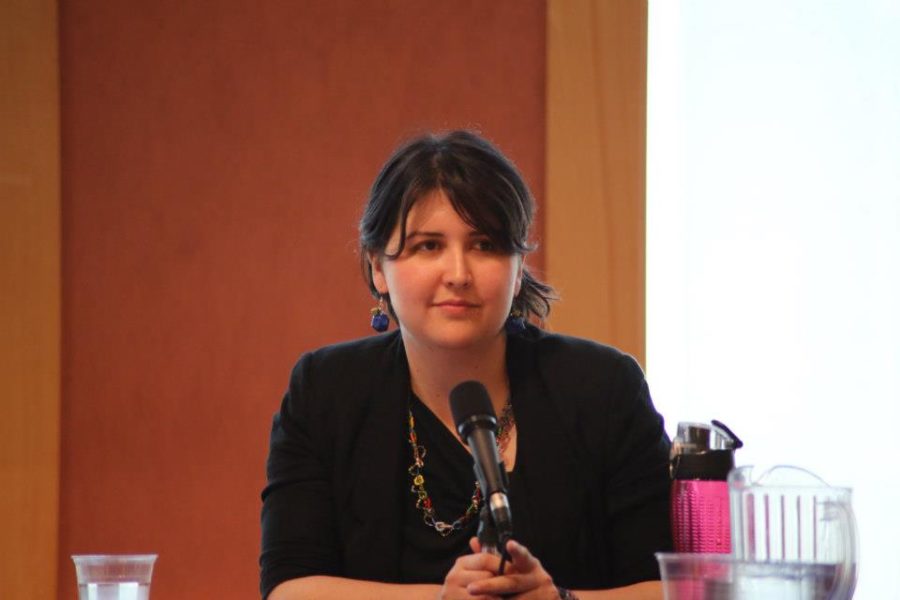 Award-winning ASB President Jessica Jones listens to speakers at a conference.