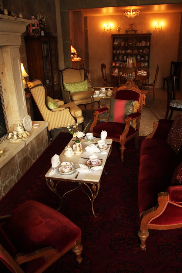 Next to the fireplace there is a lounge area for those looking for a more casual tea experience. Puzzles and books are available for those who would like to relax.