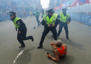 Police react in the explosion's aftermath.