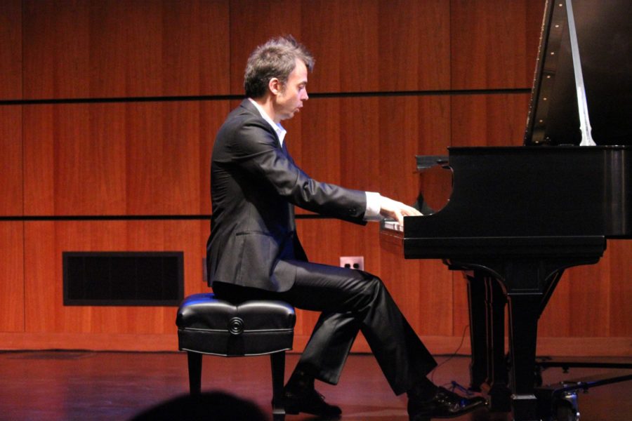 New SRJC faculty member Rudolf Budginas entertains audience members as his hands skillfully dance over the ivories at the “Bach to Led Zeppelin” show.