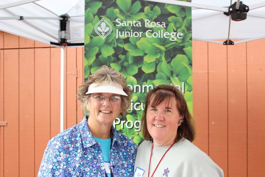 Environmental Coordinator Pamela Lococo poses with her assistant Kathy.