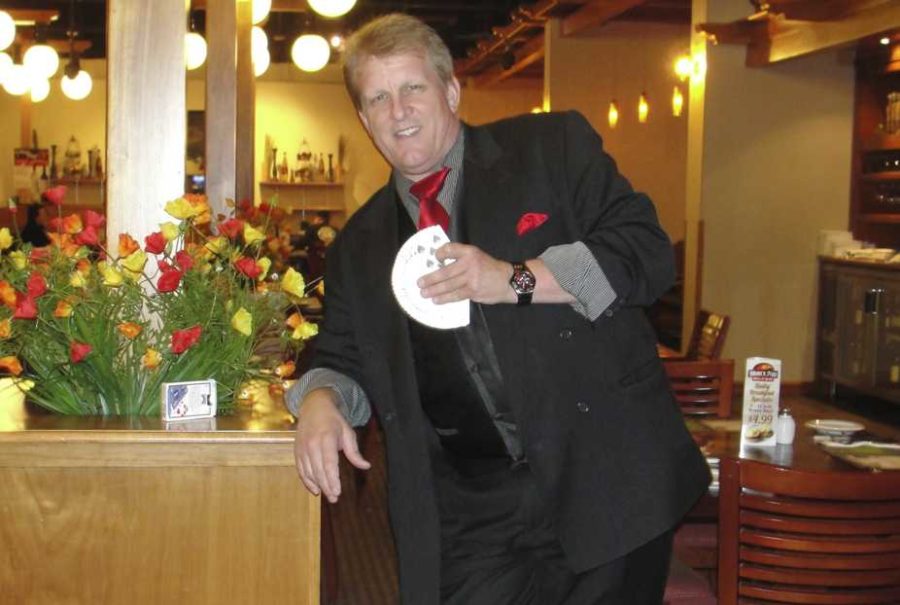 Former SRJC student and professional magic-man, Frank Balzerak, shows off his famous tools of illusion before a big show.