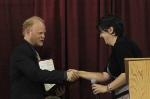 Jessica Jones (right) recieves special youth award from SCCA board member Dennis Rosatti.