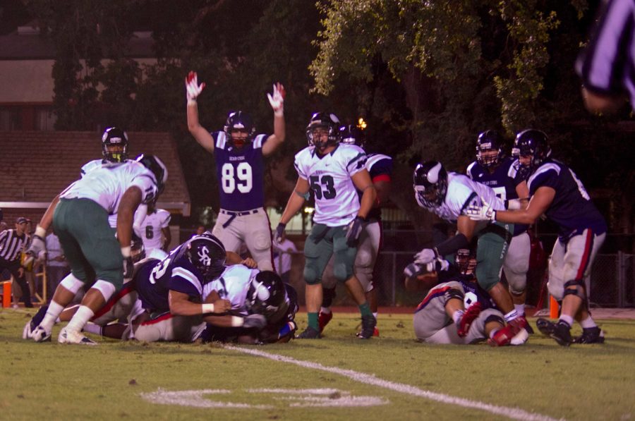 Arms raised by SRJC tight end Nick Reynolds as Bear Cubs’ running back K’Lan Anderson rushes for a 1-yard touchdown against Diablo Valley College Sept. 13 in Santa Rosa.