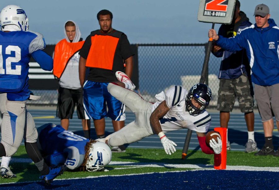 Andre Davis breaks the plane of the end zone scoring a touchdown against College of San Mateo Nov. 16 in San Mateo.