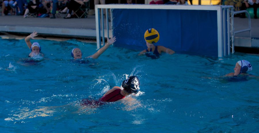 Bear Cubs' Becky Kremer hurls the ball for a score against American River College Sept. 18 at the SRJC's Quinn Aquatic Complex in Santa Rosa.