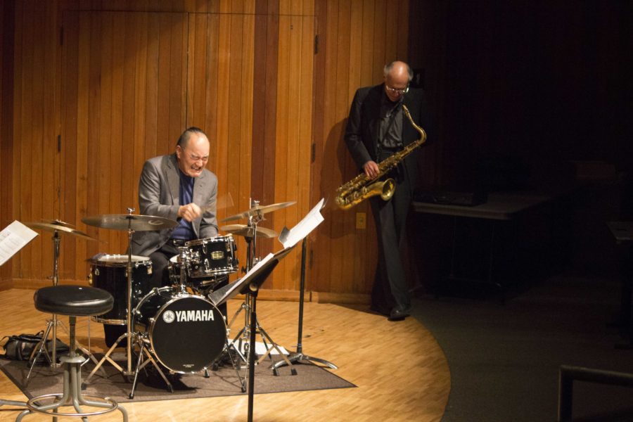 During an intense percusion solo by Akira Tana, Bennett Friedman feels the beat in the jazz quartet’s performance.