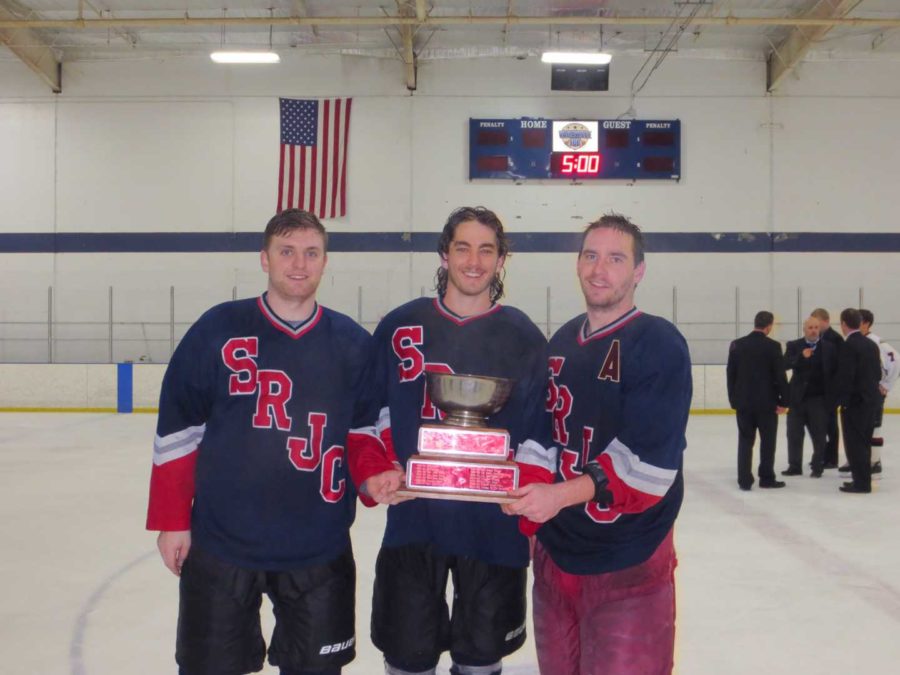 SRJC players Adam Johnson, Sam Davis and Blake Johnson pose with the PHCA trophy.