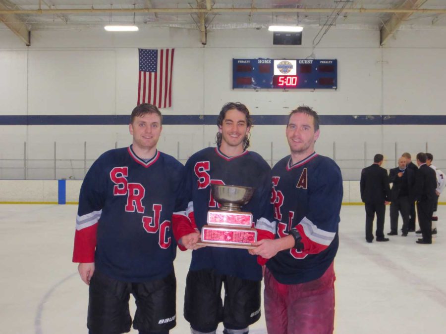 SRJC+players+Adam+Johnson%2C+Sam+Davis+and+Blake+Johnson+pose+with+the+PHCA+trophy.