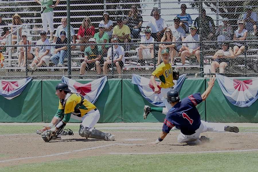 Chase Stafford slides across the plate during last year’s state championship tournament May 18 in Fresno.