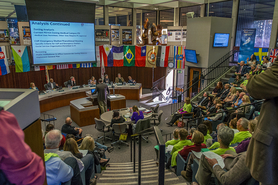 Community members and planning comissioners listen to information about the proposed Dream Center to help foster kids and homeless outh ages 18-24.