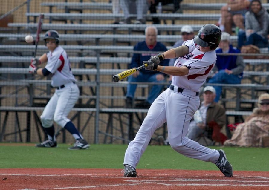 Bryan Weston almost knocks the skin off the ball for an RBI triple against Napa Valley March 1 at Sypher Field Santa Rosa.