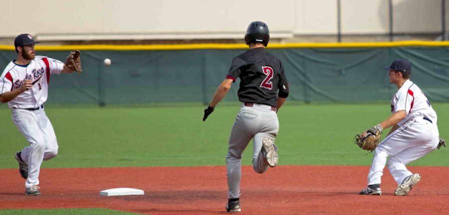 Bear Cubs’ second baseman Chase Stafford tosses the ball to shortstop Phil Ramos to begin a four-five-three double play against Sierra College April 24 at SRJC’s Cook Sypher Field in Santa Rosa.