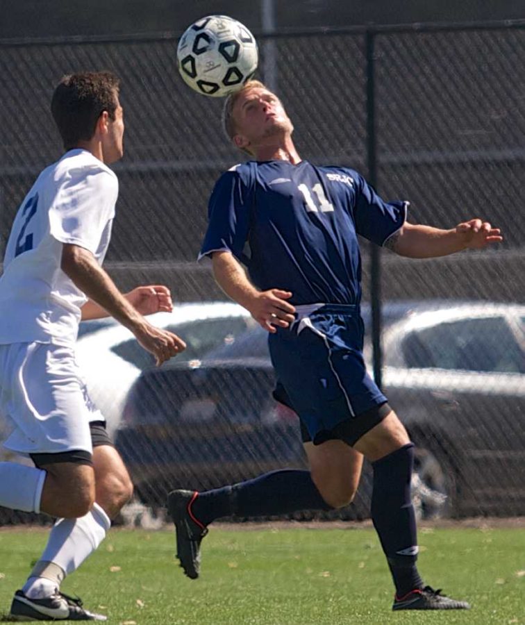 Andrew Carlile heads the ball down the sidelinelooking for another scoring opportunity against Modesto Junior College Sept. 30 at Sypher Field Santa Rosa.