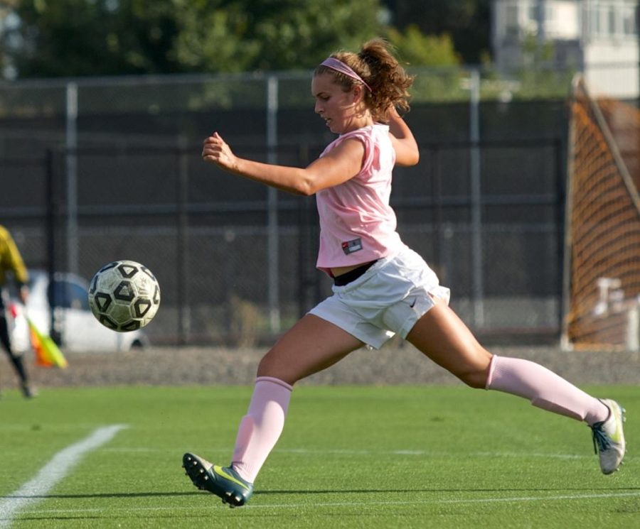 Kayleen Belda runs down the ball to make a touch pass on a Bear Cub scoring chance against ARC Oct. 7 at Sypher Field.