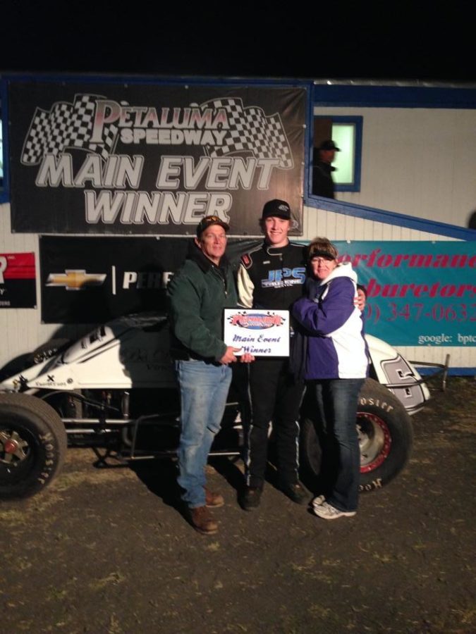 Joe Stornetta celebating in victory lane with his mother and father.