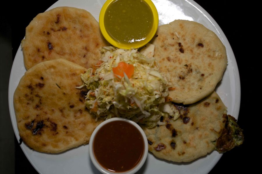 Pork, bean and cheese pupusas served with their curtido and salsa accompaniments from Pupuseria Salvadorena in Santa Rosa on Maple Avenue.