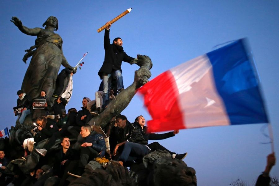 Supporters of free speech gather on the Marianne statue in Paris, France.