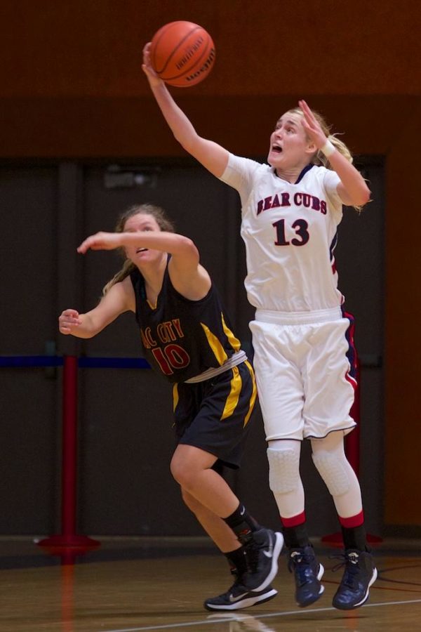 Jenna Dunbar steals a pass initiating a fast break against Sac City College Jan. 16 in Haehl Pavilion Santa Rosa.