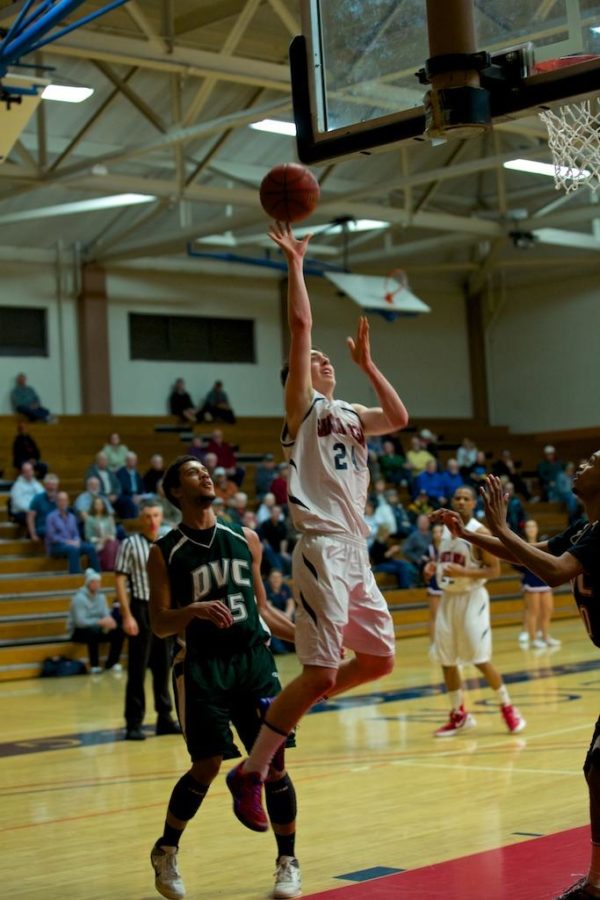 Alec+Kobre+skies+a+rainbow+from+down+low+against+DVC+Feb.+18%2C+2014+in+Haehl+Gym+Santa+Rosa.+Kobre+now+plays+DI+basketball+for+the+University+of+Pacific.