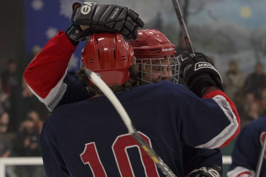 Andrew Mason congratulates Colin Ridenour after scoring against SJSU Feb. 7 at Snoopy’s Home Ice in Santa Rosa. 