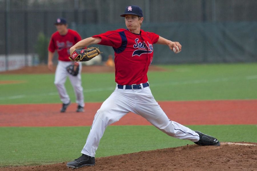 Evan Hill sends bb's across the plate against Contra Costa in long relief Feb. 17 at Sypher Field.