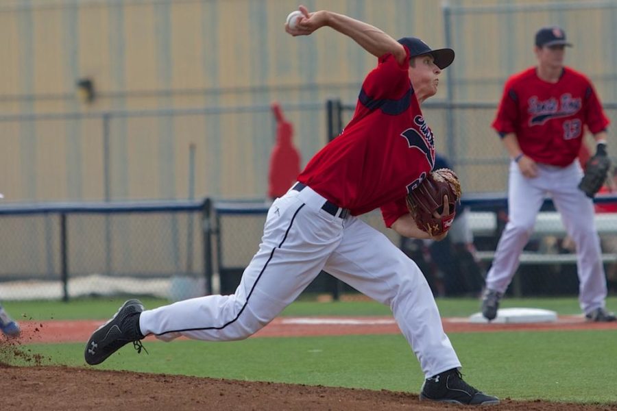 Garret Hill rears back to unleash the ball against Solano batters Feb. 19 at Sypher Field.