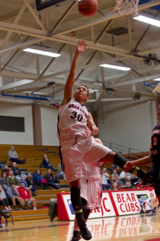 Niambi Saint Louis finishes a fast break with a bucket against Cosumnes River College Jan. 27 at Haehl Pavilion.