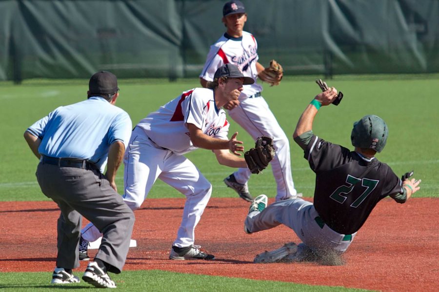 SRJC+shortstop+Mike+Reynolds+tags+out+DVCs+Ryan+Meisenheimer+attempting+to+steal+second+base+with+a+perfect+throw+from+back-up+catcher+Jackson+Leslie+March+5+at+Sypher+Field+Santa+Rosa.+The+Bear+Cubs+would+win+the+game+with+a+final+score+of+4-1.