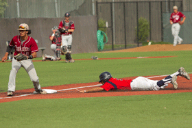 Jake Scheiner steals third base on a passed ball against Sierra College April 24 at Sypher Field.