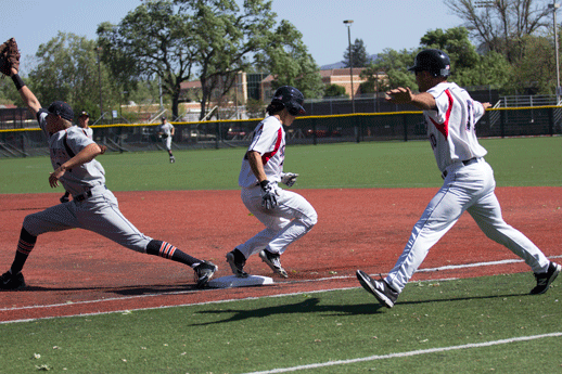 A Bear Cub is called safe at first base March 31 at Cook-Sypher Field. 