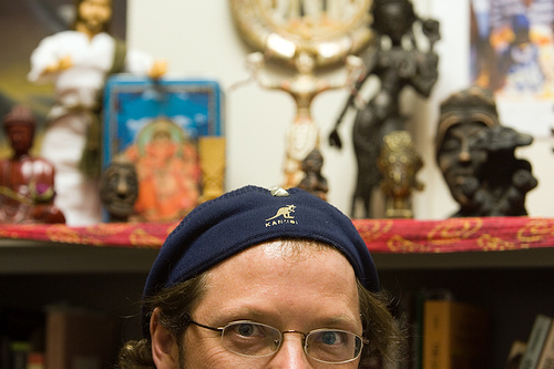 SRJC professor Eric Thompson poses for a picture in his eccentric office.