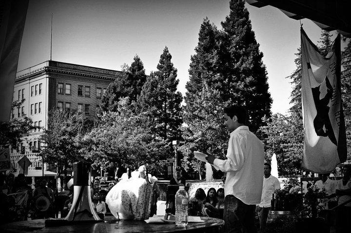 SRJC alumnus Armando Garcia speaks at “Light the Torch,” an SRJC student-organized rally downtown to inspire students to push for an immigration reform and allow DREAMers to share their stories. 