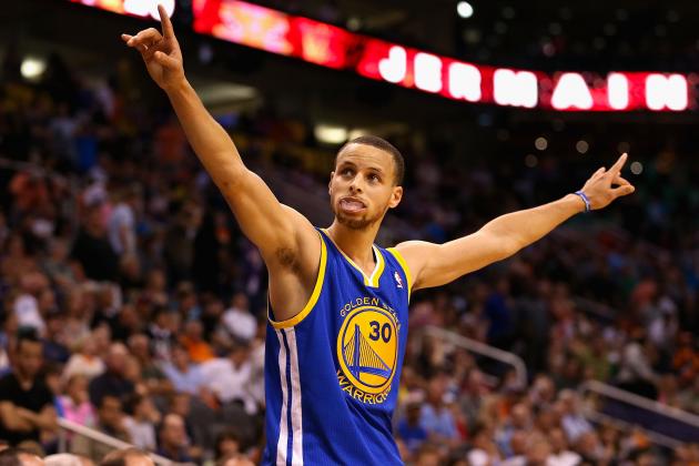 Stephen Curry raises his hands during a game. Curry was announced league MVP . This is Curry’s first MVP award.