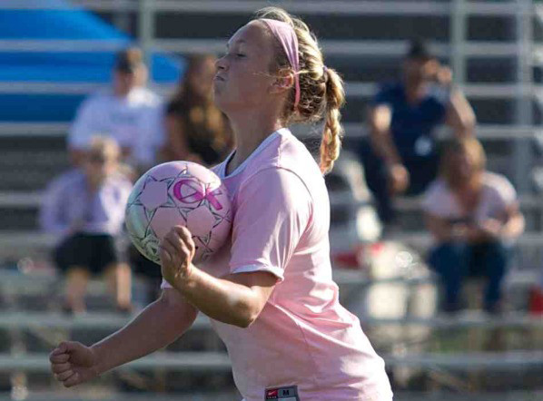 Annie Studdert traps the ball before resuming her attack downfield against Cosumnes River College Oct. 24 at Sypher Field in Santa Rosa.