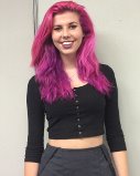 Devan Deleon sports hot pink hair that accentuates her bubbly personality.   