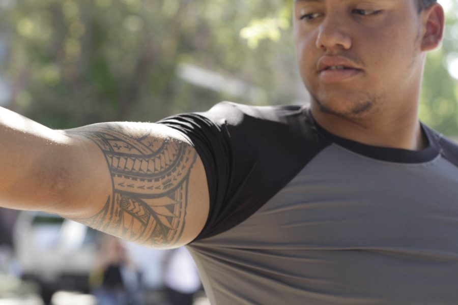 SRJC communications major Carlos Soto displays his tribal tatoo