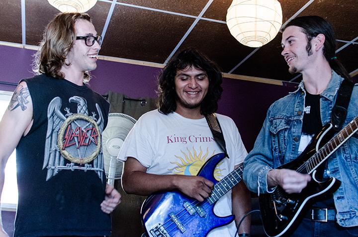 Giulletti, Olguin, and Olney-Burnett chat after band practice. 