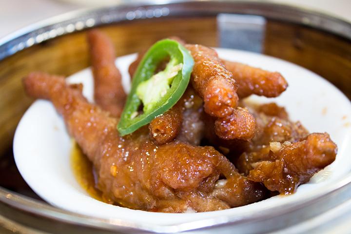 Tender chicken feet soaked in black bean sauce.