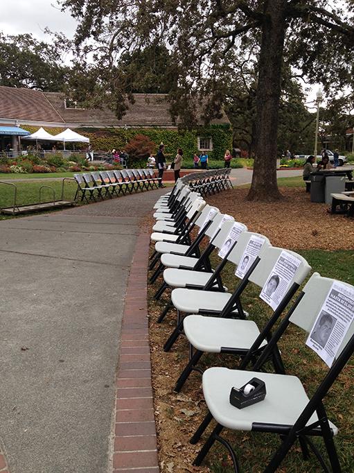 M.E.Ch.A displays empty chairs representing each of the missing 43 students of Ayotzinapa, Mexico.