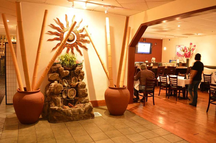 Water flows from a calming stone fountain at the front doors of Toyo Bar & Grill located off Piner Road in Santa Rosa. 