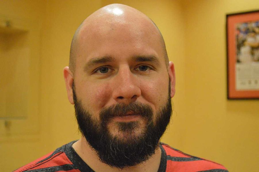 Paul Press spends time grooming his beard to keep it looking good daily. 