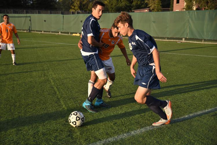 Bear Cubs midfielder Nathan Bell takes the ball to the goal against Consumnes River College