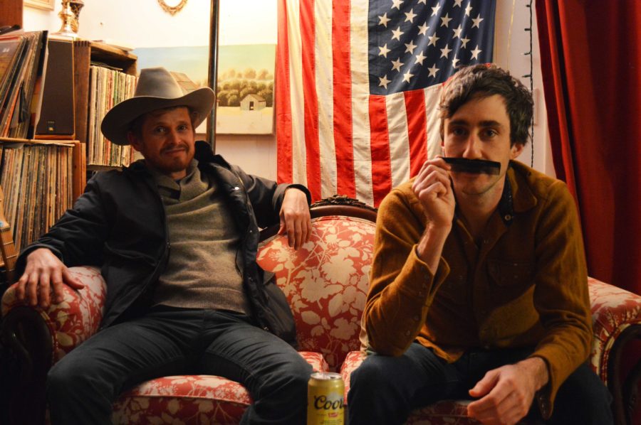 Sage Fifield (right) and Kevin Carducci (left) of The Easy Leaves duo enjoy a beer in Carducci’s cozy home located in the heart of Roseland. The pair have spent the last eight years traveling the world and playing music together.   