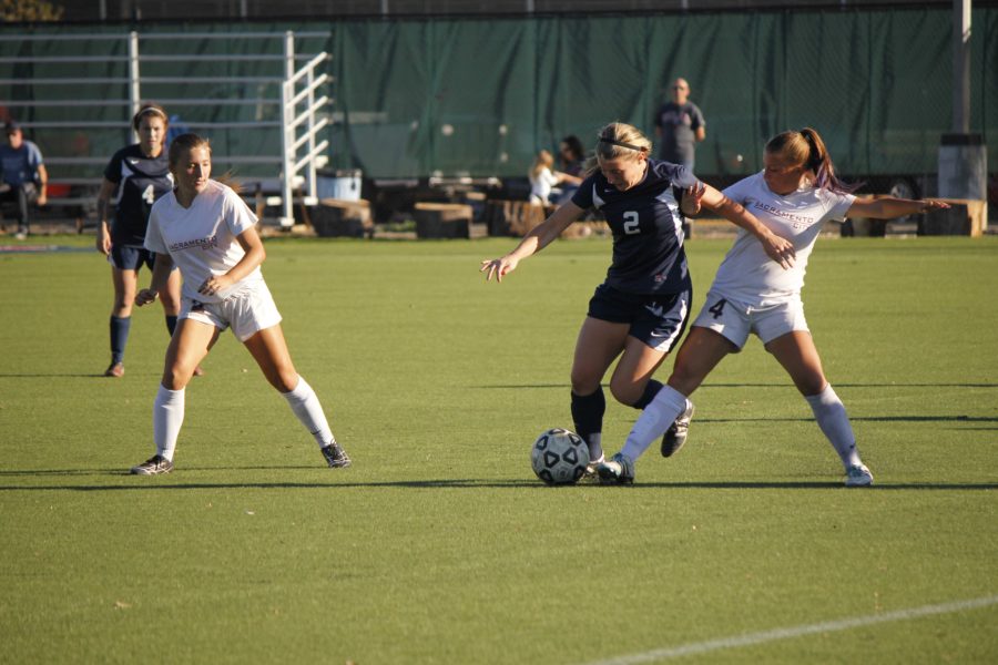 Bear Cubs defender Megan Flynn fights for possession of the ball against San Joaquin Delta College. Flynn is part of a dominant defensive unit that allowed just nine goals over the entire regular season.