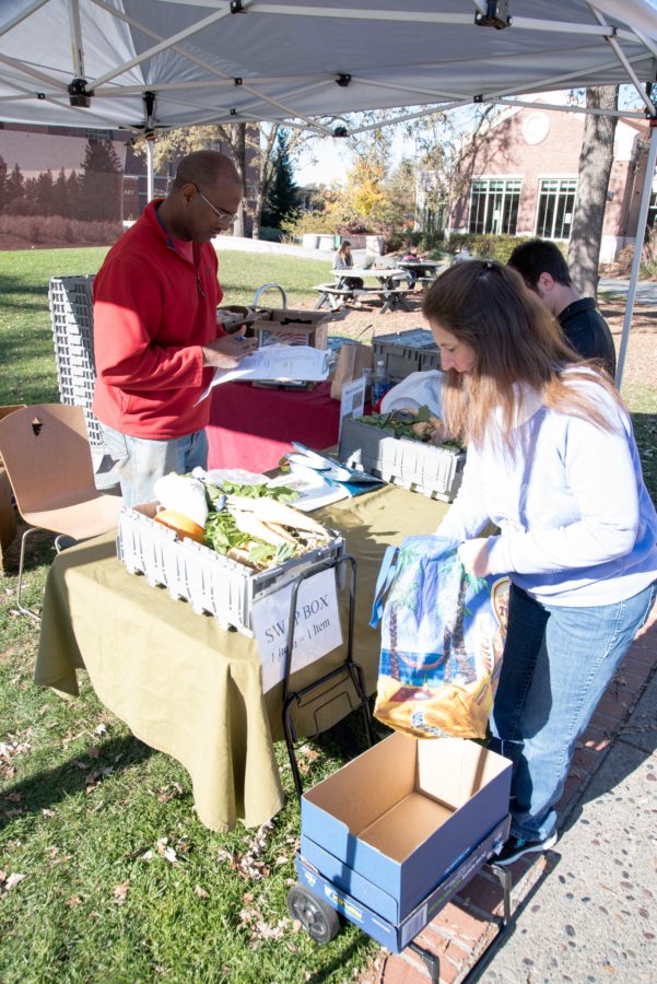 CSA+members+pick+up+food+they+ordered+from+Shone+Farm+every+Wednesday+and+Thursday+at+Bertolini+quad.+